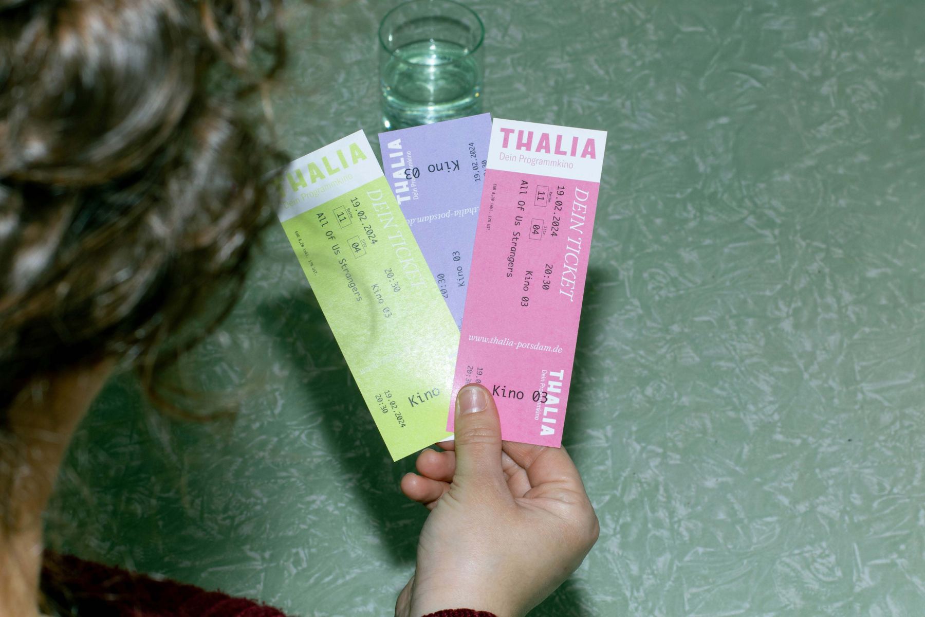 Kinotickets des Thalia in Grün, Lila und Pink